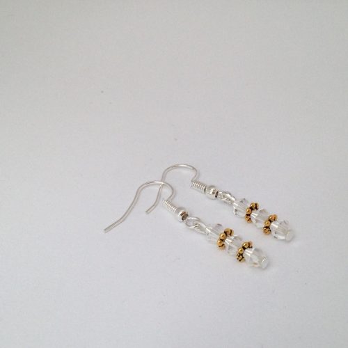 Boucles d'oreilles transparentes et or