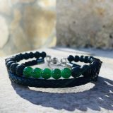 Bracelet Magali noir Bracelet Magali noir - unisexe avec tourmaline et pierre de lava, cuir noir tressé Bracelet Magali pour lui et pour elle avec tourmaline et pierre de lava Bracelet Magali unisexe avec les pierres semi précieuses : tourmaline et pierre de lava, lanière tressée en cuir noir en double rangée, avec la chaine en acier inoxydable et une perle pour ajuster à la parfaite taille de votre poignée