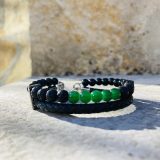 Bracelet Magali noir Bracelet Magali noir - unisexe avec tourmaline et pierre de lava, cuir noir tressé Bracelet Magali pour lui et pour elle avec tourmaline et pierre de lava Bracelet Magali unisexe avec les pierres semi précieuses : tourmaline et pierre de lava, lanière tressée en cuir noir en double rangée, avec la chaine en acier inoxydable et une perle pour ajuster à la parfaite taille de votre poignée