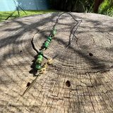 Collier Onésime repositionnable pour homme, accessoire idéal ajustable et modifiable en longueur avec l'oeil de tigre vert