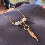 Collier or et blanc en acier inoxydable Soe Ari ajustable en longueur Avec les boucles d’oreilles longues Soe Ari, peut etre porté à l'endroit ou à l'envers